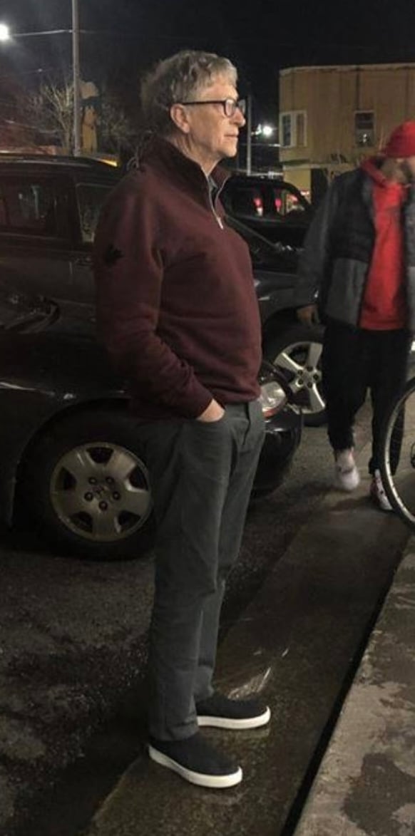Bill Gates waiting  in line for Dick's
