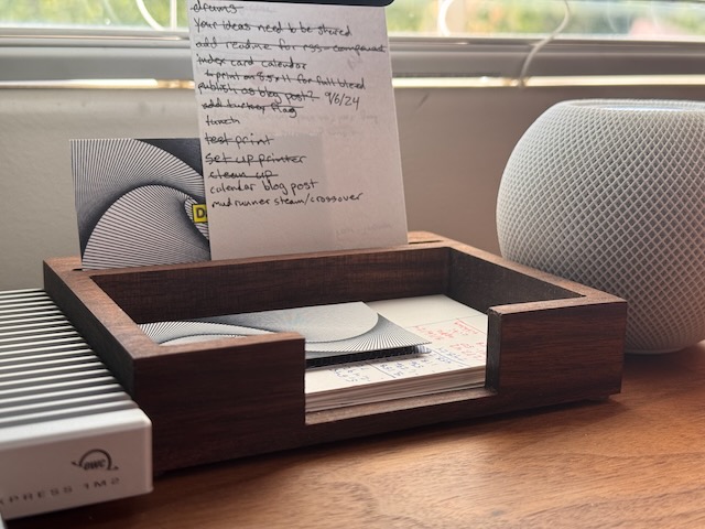 a photo of a 3x5 index card tray and stand sitting on a desk